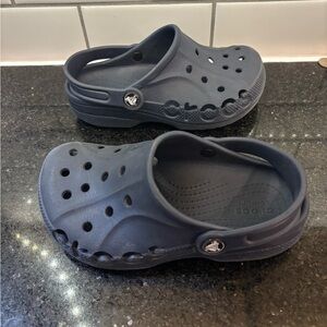 Size one navy Crocs